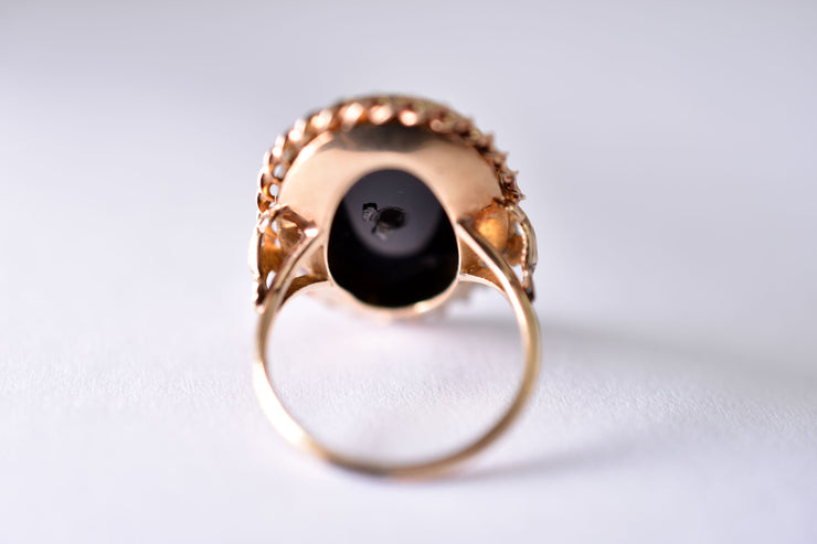 Vintage Statement Ring with Onyx Face and Silver Floral Center